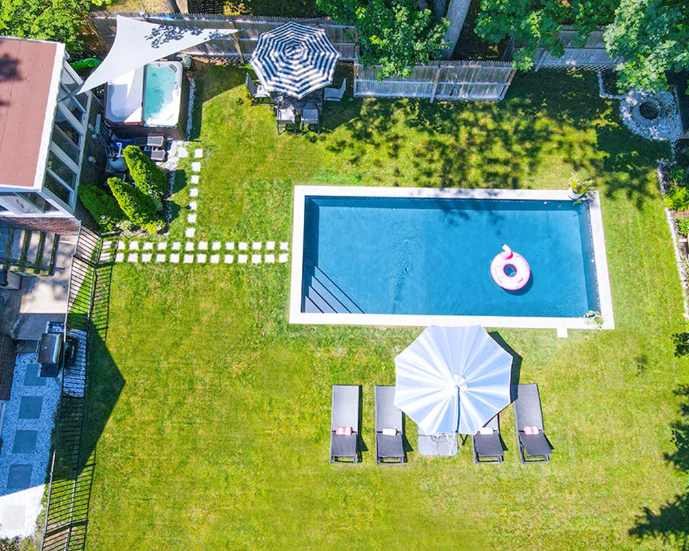 home swimming pool with a beautiful landscape view